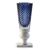 Designed by Marcel Wanders, Baccarat's Kings of the Forest vase was inspired by nature and the Dutch art of lace making. Combining various materials and patterns, it features diamond-cut crystal atop a marble base.