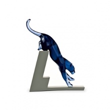 Take the leap with this midnight blue crystal panther figurine. Designed by Rosetta, the realistic sculpture rests atop the silicone-coated base (but is not attached to it).