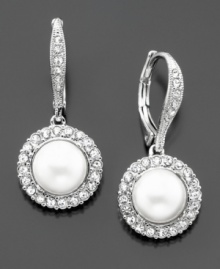 Classic elegance with added sparkle. These gorgeous vintage-style earrings by Eliot Danori feature crystal accents and glass pearls set in silvertone mixed metal. Approximate drop: 1-1/4 inches.