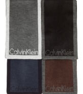 Wear a scarf knit with a name that stands for the best in modern menswear: Muffler with jacquard Calvin Klein logo and coordinating contrast edge.