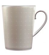 Wake up to fresh, luminous style with this fine china mug. From innovative designer Monique Lhullier's collection of dinnerware and dishes, it features a pearlescent border with glossy raised dots and a fine stitch-like pattern.