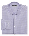 John Varvatos Star USA tailors this handsome dress shirt with a slim fit for a modern silhouette that translates from work to after-hours.