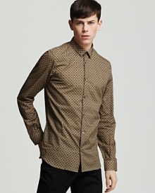 Crisp cotton showcases a classic button front shirt from Burberry London.