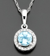 Accessorize your neckline with a light and bright pendant featuring round-cut aquamarine (3/8 ct. t.w.) surrounded by sparkling diamond accents. Set in 14k white gold. Chain measures 18 inches; drop measures 1/2 inch.