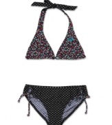 Make her style stand out in this reverse halter top two-piece set from Roxy.