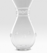 Old-world style and graceful lines appoint a mouthblown glass carafe that easily doubles a beautiful vase. 40-oz. capacity 9½H X 5 diam. Dishwasher safe Imported 