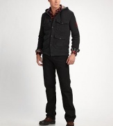 In black-washed denim with a classic fit, a modern jean for the modern man.Zip flyButton closureBelt loopsFive-pocket styleComfortable fit through hip and thighInseam, about 34CottonMachine washImported