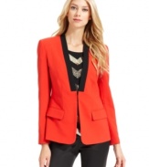 Vince Camuto crafts a bold blazer with a collarless silhouette and a contrasting faux lapel.