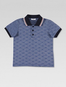 Distinctive double-G diamond pattern polo shirt sports signature stripes at the collar.Striped rib knit polo collar Button placket Short sleeves with solid banded cuffs Straight hem Cotton; hand wash Made in Italy