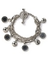 MARC BY MARC JACOBS' silver chain bracelet has designer appeal. Trimmed in the label's charms, this jazzy style has fashion forward written all over it.