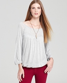 This feather-light Soft Joie top cuts a billowy blouson silhouette for a flattering fit.