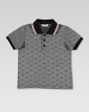 Distinctive double-G diamond pattern polo shirt sports signature stripes at the collar.Striped rib knit polo collar Button placket Short sleeves with solid banded cuffs Straight hem Cotton; hand wash Made in Italy