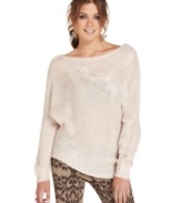 Snuggle into this comfy, open-stitch sweater from Jessica Simpson. An asymmetrical cable-knit design across the chest and an oversized fit make this the perfect choice for a casual at-home or going-out look!