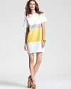 Shine as bright as the sun in this brilliant 10 Crosby Derek Lam color block tunic--a perfect topper to crisp white pants for getaway-chic.