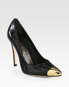 Vintage-inspired pump of snake-embossed patent leather with a gleaming metal point toe. Self-covered heel, 4½ (115mm)Snake-print patent leather upper and metal toe capPointed metal toe capLeather lining and solePadded insoleImported