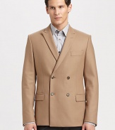 Made from an Italian wool/nylon blend, a blazer with peak lapels and a structured fit. Double-breasted styleLong sleevesAbout 29 from shoulder to hem< 80% wool/20% nylonDry cleanImported of Italian fabrication