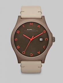 This rich and neutral style features a brushed case and supple leather strap. Quartz movementWater resistant to 5 ATMRound brown brushed stainless steel case, 43mm (1.7)Brushed bezelBrown dialLogo hour markersDate display at 3 o'clockSecond hand Semi-shiny shell colored leather strapImported 