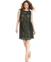 Jessica Simpson revamps a plus size shift silhouette with a panel of inset lace, a cinched waist and scalloped hem.