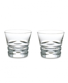 Classic technique, modern beauty. Crafted of fine crystal, the Lola double old-fashioned glasses from the Baccarat drinkware collection pair horizontal wedge cuts, thick shams and a silhouette that radiates grace and sophistication.