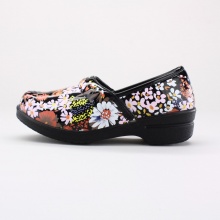 Flower power! For casual comfort and a confident style, these girls' closed clogs will put her in the right direction. Features a flower printed synthetic upper with padded instep and synthetic sole. Imported.