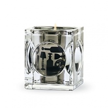 Two-piece set. Jar designed by Thomas Bastide. Clear, full-lead crystal cube with magnifying lenses on every side. Candle: Floral, spicy, feminine. 100% vegetable wax. Burn time- 40-45 hours.