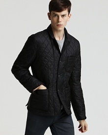 Classically quilted, this tailored Burberry Brit jacket doubles as outerwear and an indoor-appropriate layer.