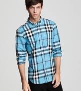 Burberry's essential button-down rendered in a rich check pattern and slim fit.