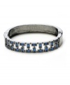 Rhapsody in blue. Baguette crystals in a chic cobalt hue add sparkling style to Kenneth Cole New York's stretch bracelet. Crafted in hematite tone mixed metal, the stretch design lets it slip on and off with ease. Approximate length: 7-1/2 inches.