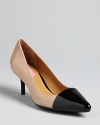 Check off all the shoe style boxes with these pointed toe, cap toe pumps from designer Isaac Mizrahi.