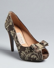 These exquisite Salvatore Ferragamo platform pumps are fit for royalty, crafted in luxurious tapestry lace.