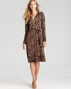 In a lively medley of animal prints, this MICHAEL Michael Kors dress enlivens your 9-to-5 style. Finish the look with polished pumps and get in step with the fashion pack.