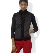 Lauren Ralph Lauren's luxurious quilted satin vest reverses to a plush faux-shearling side, doubling the glamorous wardrobe-styling options for the modern woman.