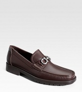 A classic leather loafer, expertly constructed in Italy from premium leather with a silvertone accent and signature lug sole. Leather lining Padded insole Rubber sole Made in Italy