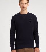 Classic fitting crewneck lends a carefree, casual tone to your weekend basics, rendered in lightweight cotton for extended wear and comfort.CrewneckRibbed knit cuffs and hemCottonDry cleanImported