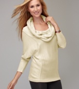 A slouchy fit and dolman sleeves give Style&co.'s sweater a feeling of relaxed elegance! The cable knit cowl adds a unique touch, too. (Clearance)