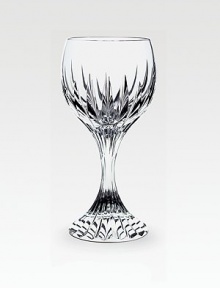 A classic beveled pattern extends down the stem of a luminous red-wine glass crafted in pure lead crystal. From the Massena Collection 8.75 oz. 7 high Hand wash Made in France