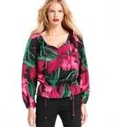 MICHAEL Michael Kors adorned this petite peasant top with an exotic floral print for a vibrant effect.