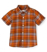 Check printed cotton in a warm orange hue adds grown-up charm to this Burberry shirt for boys.