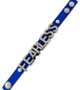 Fearless fashion. A bold neon blue PVC bracelet from BCBGeneration with silver tone mixed metal letters and snaps. Approximate length: 8 inches.