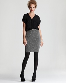 This clever Dolce Vita dress appears as two pieces, but is actually one: a sheer v neck blouse with chest patch pockets and a textured pencil skirt featuring a sleek black belt. The epitome of workweek chic, the look is complete with tights and platforms.