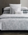 A garden of earthly delights. The Laurel comforter set from Calvin Klein offers a fresh take on natural sophistication with a yarn-dyed jacquard of overlaid woven flowers in cool, soothing tones. Reverses to self.