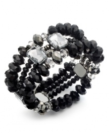 Crystal clear fashion with an edge, by Bar III. This stretch bracelet brings together jet black plastic beads with clear acrylic stones. Stretches to fit wrist. Crafted in hematite tone mixed metal. Approximate diameter: 2-1/2 inches.