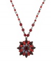 Red alert. Radiant red glass accents add a beautiful burst of color to 2028's ornate pendant necklace. Set in hematite tone mixed metal. Approximate length: 16 inches + 3-inch extender. Approximate drop: 1-1/4 inches.