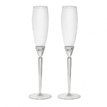 Monique Lhuillier for Royal Doulton Modern Love Metal Gifts feature modern shapes with intricate details. The collection of silver plated gifts are treated with a lacquer coating to eliminate fingerprinting and scratches and includes popular wedding gifts like frames, toasting flutes and a cake knife and server.