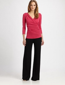 Flattering wide-leg silhouette, rendered in an easy stretch jersey knit.Mid-rise waistband Flat-front Inseam, about 33½ 70% rayon/27% polyester/3% spandex Dry clean Imported