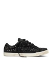 Covered in black sequins, these glammed-up Converse lace-ups put a delightful spin on the average sneaker.