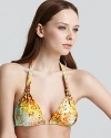 Get wild with PilyQ's abstract animal printed bikini, dressed up with polished, gold-tone hardware.