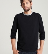 Long sleeve crewneck tee shirt in a comfortable, lightweight cotton. Contrasting, ringer collar.