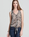 Emblazoned with a global-inspired print, this Vintage Havana tank features a faux-button front and chic tie at the hem.