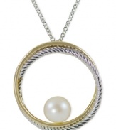 Abstract elegance. A cultured freshwater pearl (8-8-1/2 mm) stands at the center of this circle pendant, suspended from a 14k gold and sterling silver necklace for a bit of postmodern appeal. Approximate length: 18 inches. Approximate drop: 2 inches.